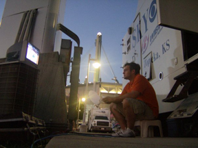 March-ing forward Blake Kresge sits just a few hundred feet away from the Kansas-Memphis NCAA Championship game, watching it on a 15-inch TV next to WIBW-TVs satellite vehicle. Kresge had press credentials for the first two rounds in Omaha, Neb., and access to the players.
