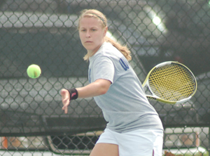 Stung Senior Audrie Miller returns a volley in Wednesdays 6-3 loss against Emporia State at Washburn. Miller lost her No. 3 singles match 6-1, 6-2 to freshman Amanda Morris.
