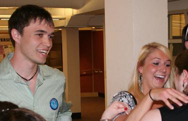 Garrett Love (left) and Caley Onek (center) celebrated their landslide victory over opponents Will Lawrence and Charity Hockman. The duo garnered 67 percent of the record 1,388 presidential votes.
