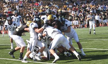Hornets swarmed Despite an impressive 56-35 win against rival Emporia State on Saturday, Washburn is not going to the playoffs. Nebraska-Omaha and Missouri Western, both 6-3 in the MIAA, will represent the conference in the Kanza Bowl and the Mineral Water Bowl. Photo by Matt Wilper.
