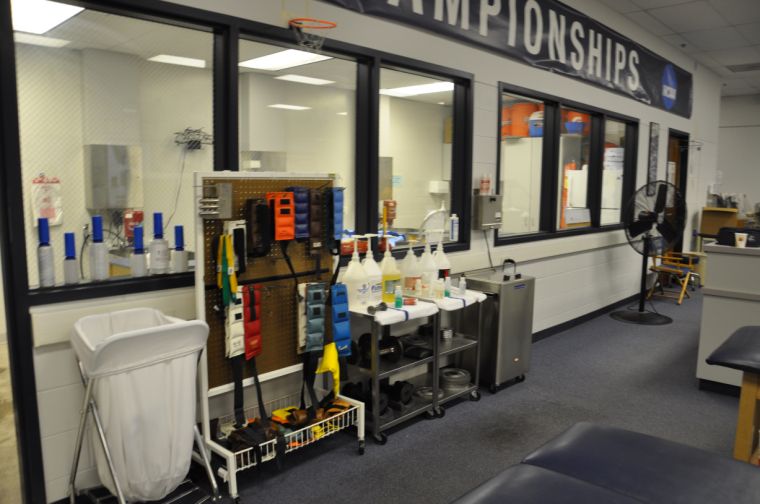 A+helping+hand+The+Washburn+Athletics+training+room+provides+student-athletes+a+chance+to+warm-up+before+practice+on+stationary+bikes+and+ellipticals.+The+training+room+is+also+used+for+treating+injuries+and+getting+taped+for+matches+and+games.+Photo+by+Mike+Goehring.%0A