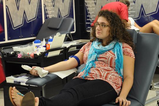 Washburn student Grace Roberts gives blood at the Alpha Delta blood drive. It was their first blood drive, although they hope to do more in the future
