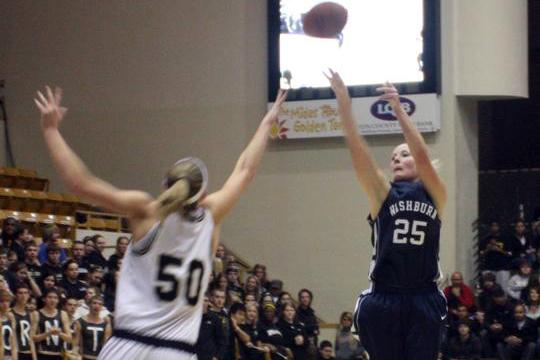 Sharp shooter Washburn basketball player Stevi Schultz takes a shot from behind the arc against Emporia State. Schultz has played a key role in the Lady Blues success this season. Photo by Rob Burkett, Washburn Review
