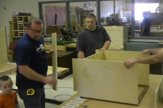 Students+at+work+WIT+students+Dan+Trimble%2C+Jordan+Busey+and+Joe+Blaske+construct+a+cabinet+as+part+of+their+Cabinet%2FMillwork+Tech+class.%0A