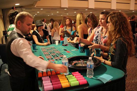 Spin the black circle Students play the roulette wheel during Washburn’s Casino Night August 18. The university’s Campus Activity Board sponsored the event.
