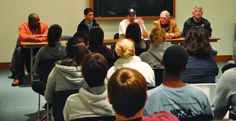 Members of the Lawrence Community Shelter sit down to a panel discussion on Washburn campus on Tuesday, Nov. 13. They shared personal life stories and ways students can help combat homelessness.
