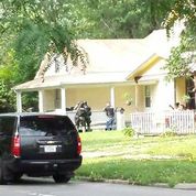 Topeka+Police+and+SWAT+surround+a+house+suspected+to+be+the+hiding+place+of+the+gas+station+shooter+June+30.