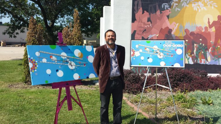 Jaime Colon was chosen as the featured artist for the 2014 Aaron Douglas Art Fair. Colon was introduced at a press conference in front of the mural at the Aaron Douglas Art Park. 