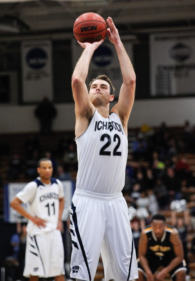 Alex North scoring his 1000th college career point at the free throw line.