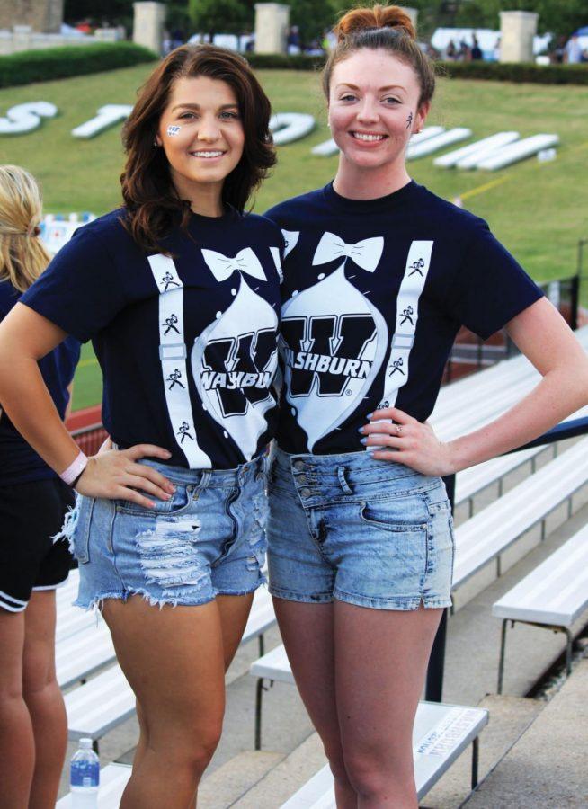 Loyal+Fans%3A+Mickayla+Bigham+%28left%29+and+Keely+Brunner+%28right%29+wear+matching+Washburn+themed+t-shirts+to+support+the+Bods+at+the+game.