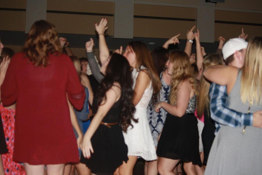 Washburn students tear up the dance floor at this year’s homecoming dance in the Washburn A/B room in the Memorial Union.