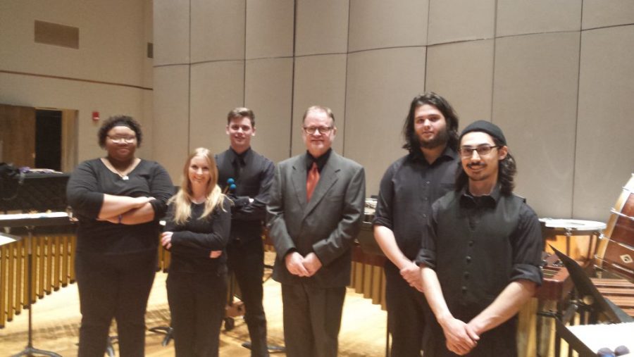 From left to right, Dulce Cortes, Shannon Brush, Jarod Barnes, Dr. Tom Morgan, Will Hartner, and Nico Williams. The group is mainly comprised of music and mass media majors.