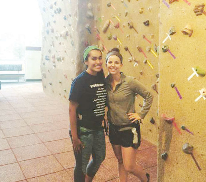 Kasey+Paez+%28left%29+and+Allie+Bellinger+%28right%29+take+advantage+of+the+SRWC+to+learn+how+to+climb+a+rock+wall.+The+SRWC+is+free+for+Washburn+students.