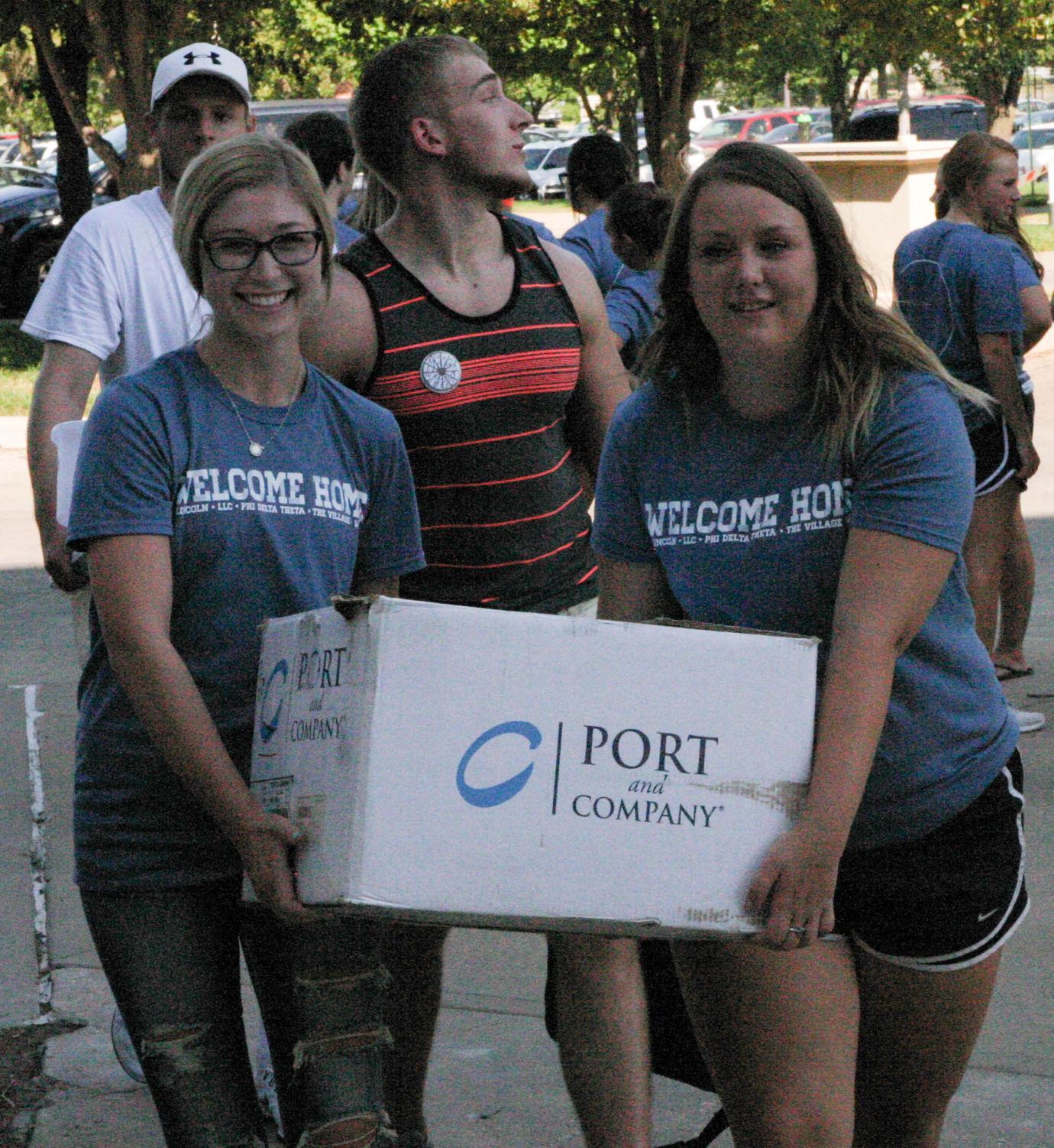 Residential Living Staff and volunteers assisting new and returning students in moving on campus. Move-In initiated Welcome Week in the morning of August 18.