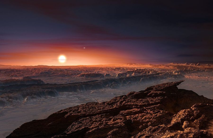 Proxima Centauri, along with the more distant Alpha Centauri A and B, is seen low on the horizon of the newly discovered planet in this artists illustration. Proxima b has a similar mass as Earth and orbits inside the habitable zone of the red dwarf star. As such, its year is only 11.2 days. Additionally, the planet it is likely tidally locked to the star, making the prospect of life on the rocky world difficult.