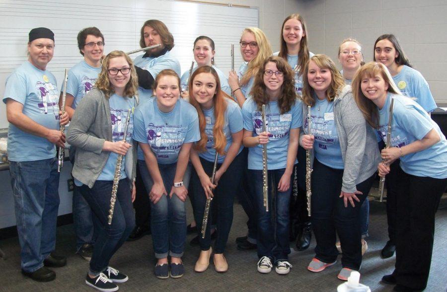 Flute Power: Washburn flute players and Music Professor Rebecca Meador, front right, spent the day sharing music with younger students.