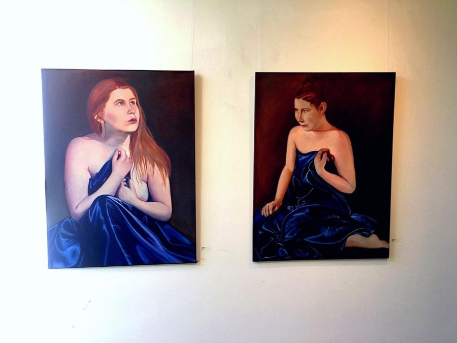 Picture Perfect: Both of Aurora Brown’s oil paintings, “Courageous” (left) and “Uncertainty,” depict partially nude women looking into the distance and holding silky blue cloth. The painting “Courageous” portrays a woman exhibiting courage and confidence, while “Uncertainty” portrays a different woman as being reserved and self conscience. This study of body language is the main focus of Brown’s work.