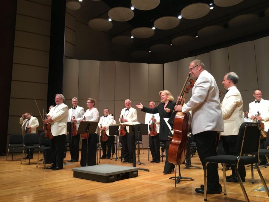 Bow Out: The Sunflower Music Festivals chamber orchestra bows during the audiences standing ovation following the final performance of the festival. The festival brought over 5,000 community members to its audience over the course of 10 days. 