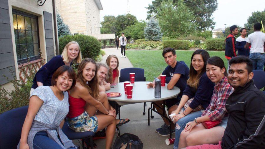 United: American and international students enjoy the potluck together.