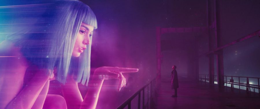 Magic: Blade Runner 2049 uses a unique mix of visual and practical effects to pull off its beautiful images. This scene in particular is not CGI but a large LED screen depicting this large hologram of the character Joi.