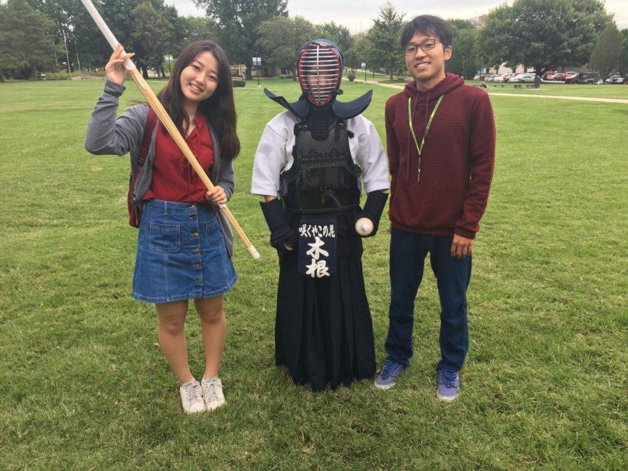 Practice makes perfect: The kendo team suits up to test their skills. Team Captain Sayaka Kine, center, is flanked by sophomore Yuki Arimura on the right and Narumi Hishinuma on the left.
