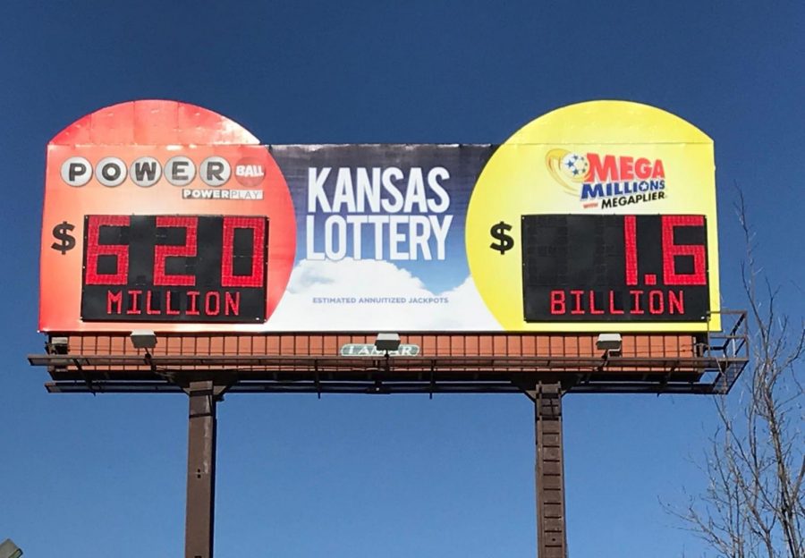 Chicken dinner: A billboard shows the record $1.6 Mega Millions jackpot and the also abnormally high $620 million Powerball. Kansans spent almost $6.3 million purchasing tickets to these two lotteries last week.