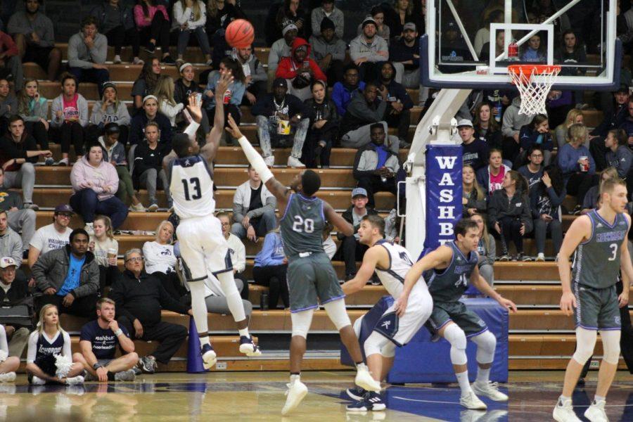 FADE: Senior guard Tyas Martin fades away on this jump shot against Rockhurst. Washburn erased a second half deficit to defeat the Hawks by four.