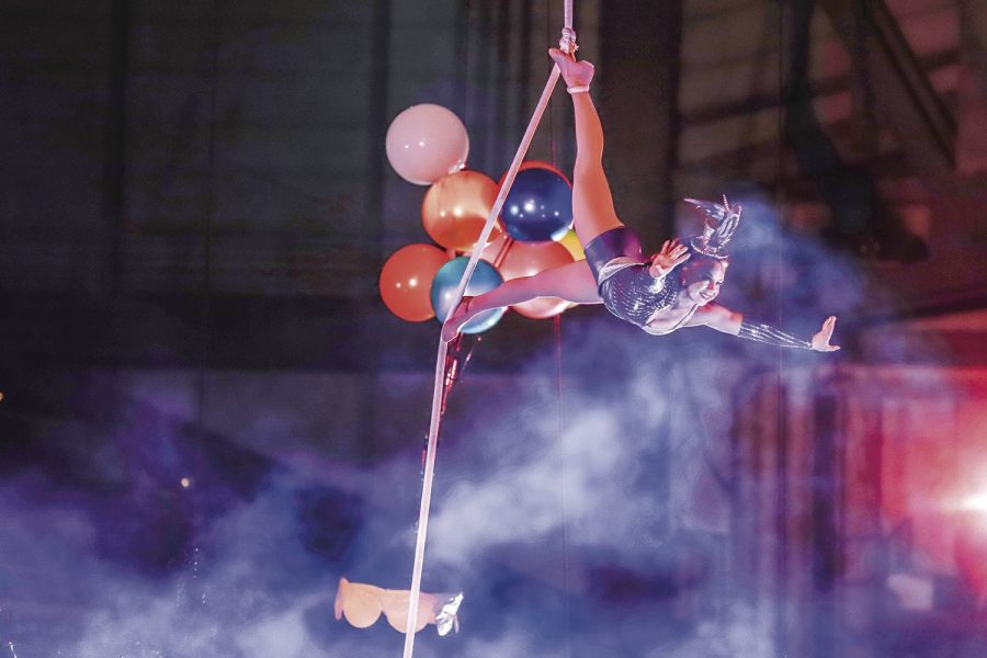 Flying high: The flying Cortes have been entertaining circus audience for generations . They performed high flying acrobatics at the Arab Shrine Circus.
