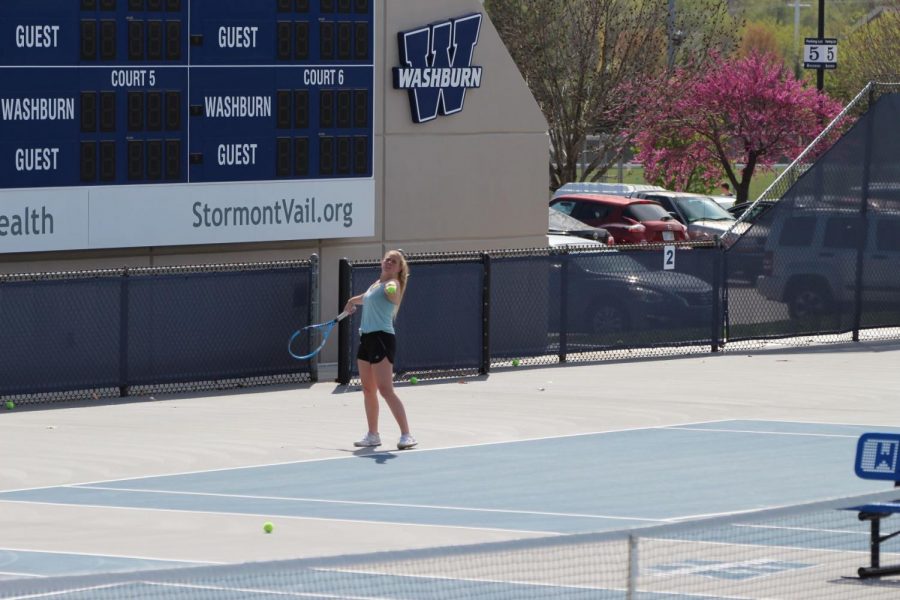 Hit+it%3A+Senior+MaKenna+Gonzales+winds+up+to+smash+the+tennis+ball.+Gonzales+and+Co.+have+won+the+MIAA+Championship+for+tennis.