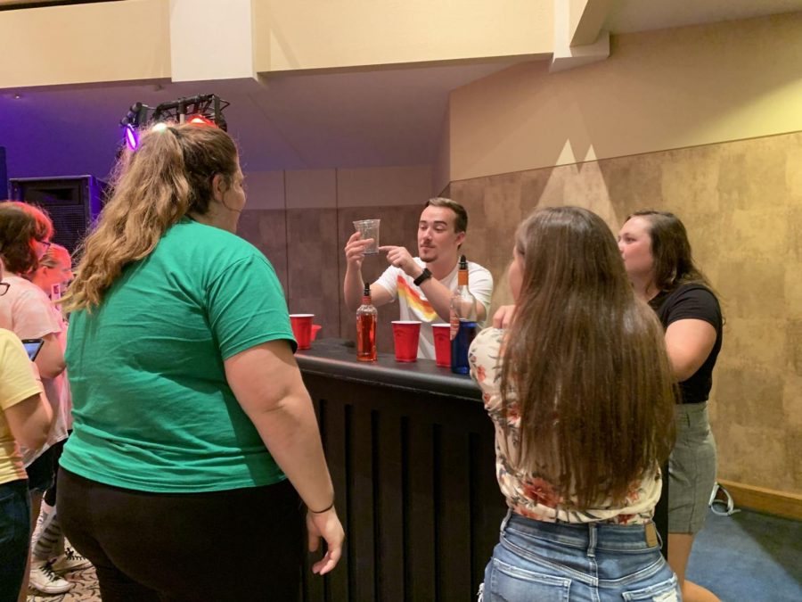 Bottoms up: The bartender teaches attendees how to pour the perfect shot. The Perfect Party was the main Wednesday welcome week event. 
