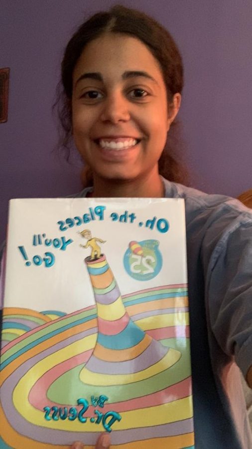 Book Worm: Hunter Bentley, a guard for the womens basketball team, breaks out a classic to read. Bentley read Oh The Places Youll Go by Dr. Seuss as her first book on the website. 