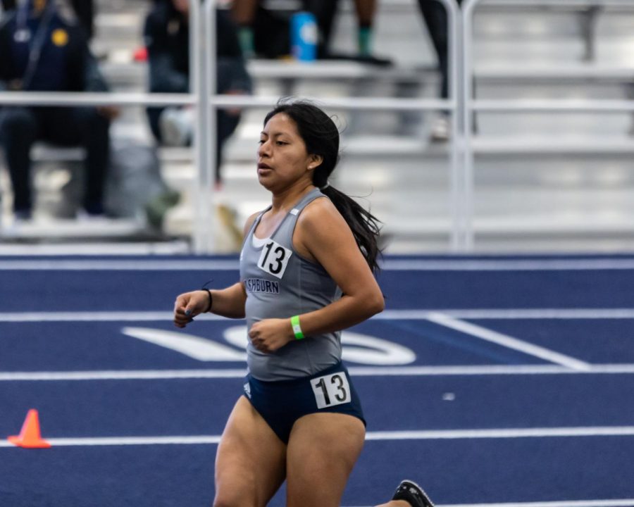 Washburns  Luz Lopez Gonzalez competes in the womens 3000 meter race. Gonzalez raced in the Washburn Open Saturday, Jan.30, placing 20th with a time of 11:39.84.