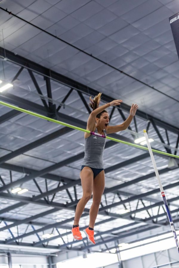 No Fear: Washburns Virgi Scardanzan getting fired up as she cleared the bar in her vault. Scardanzan place 3rd at the MIAA with a height of 139.35 on Saturday, day one of the competitions.