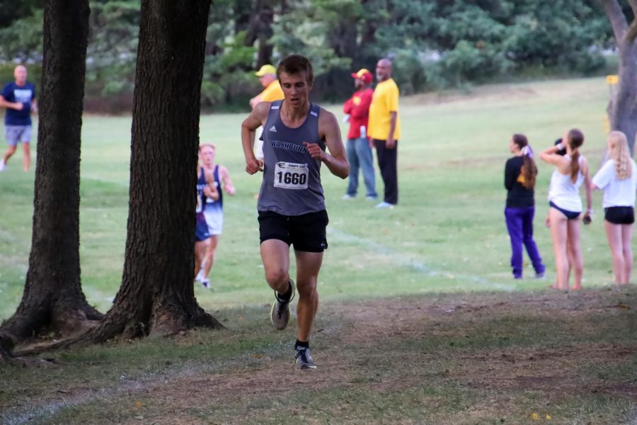 Into the woods: Gustav Morch keeps his strong pace when entering the wooded section of the course. Gustav finished in 25th place with a time of 27:39.7, earning 23 points for his team.