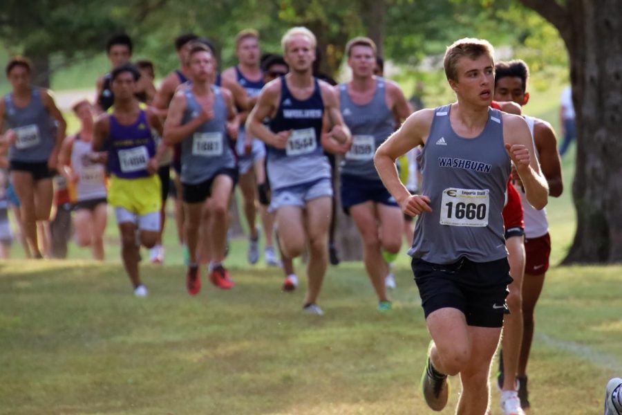 Out ahead: Gustav Morch separates himself from a group of runners and picks up the pace. Morch finished with a time of 27:39.69 on Sept. 24, 2021.