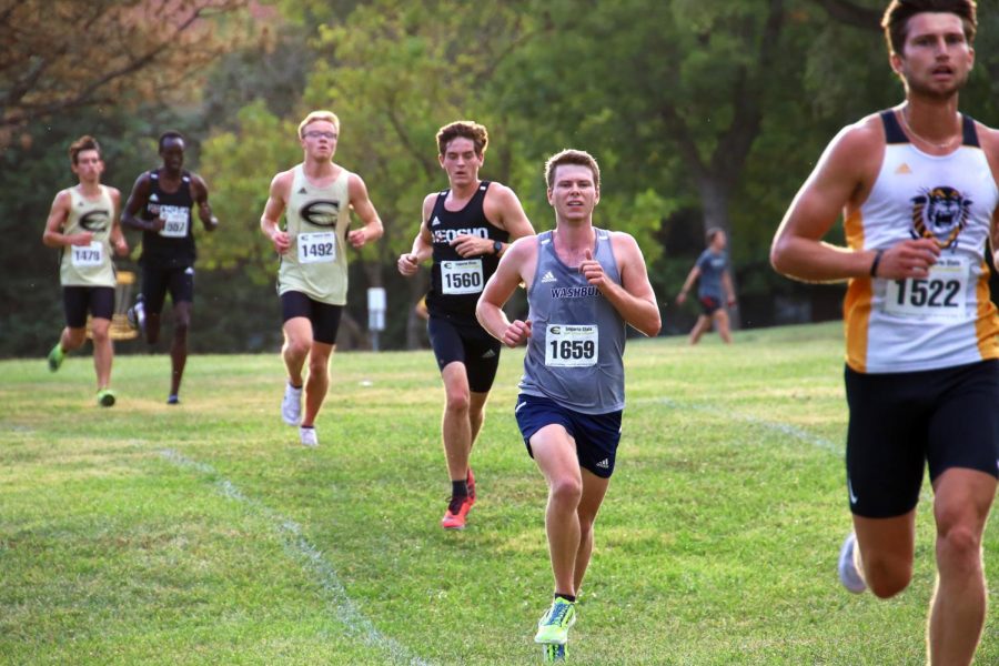 Single File: Brett Kulp works for another place while following the race line. Brett finished with a time of 27:53.2, earning 27 points for his team.