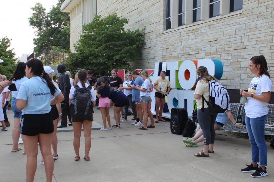 Chatting it up: Members of greek life hang out outside the Union. Students and greek life representatives mingled on Aug. 31.