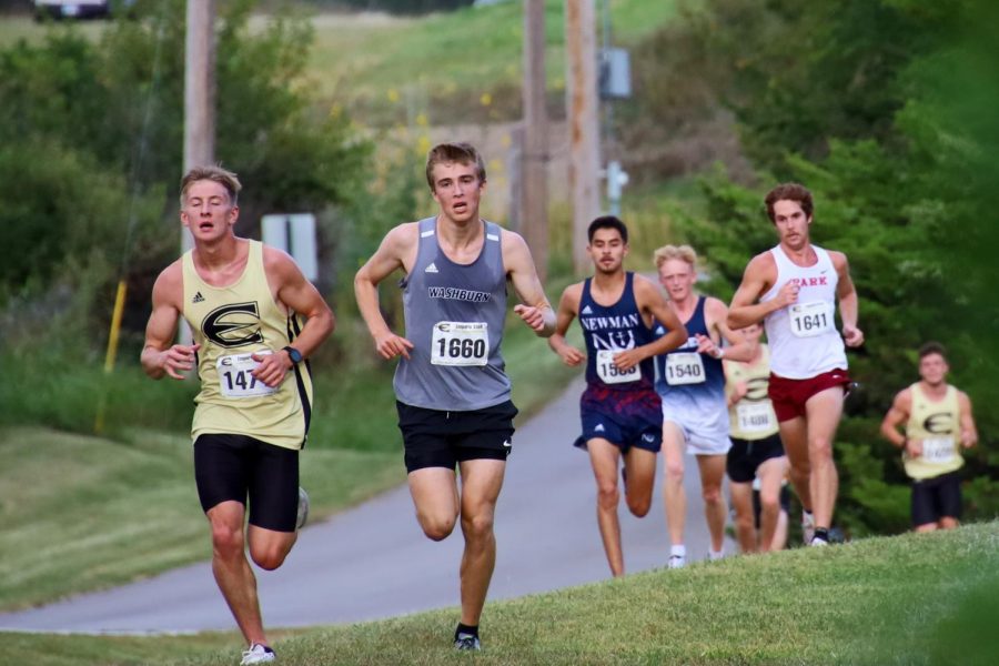 Running Up - Gustav Morch Runs up a hill battling for against emporia position. Gustav Morch finished 25th with a time of 27:39.7