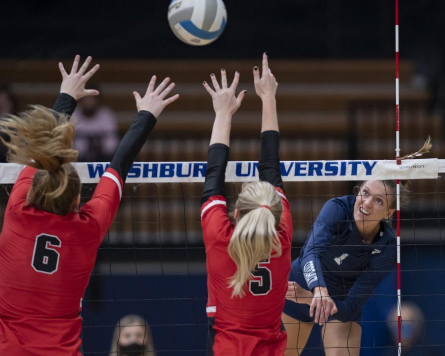 Too fast: Washburn outside hitter Genna Berg spikes the ball Thursday, Oct. 21, 2021, at Lee Arena in Topeka, Kansas. Berg finished the match with 15 kills.