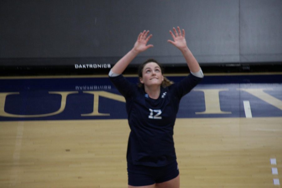 Set to assist: Senior setter Allison Sadler awaits a ball to set for a teammate on Oct.1, 2021. Sadler finished with a match-high 34 assists.