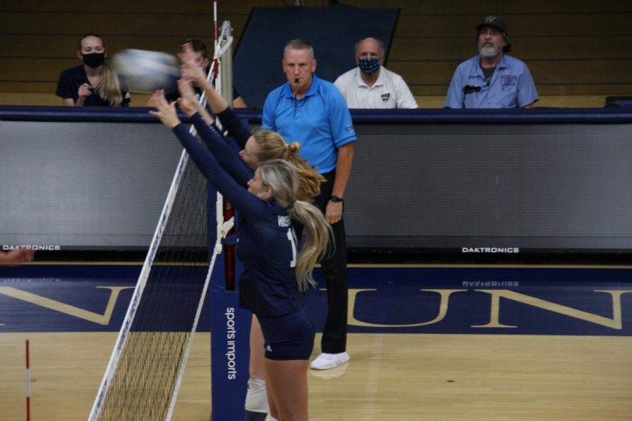 Not today: Senior middle blocker Sydney Fitzgibbons and senior middle hitter Kelsey Gordon combine to defend an attack from Newman on Oct.1, 2021. The team would defeat the Jets 3-0 in the match.