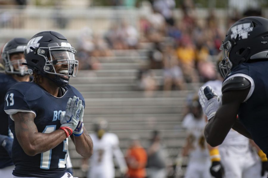 Take a bow: Washburn wide receiver James Letcher, Jr. (13) celebrates after a touchdown with Washburn wide receiver Peter Afful (2) Saturday, Oct. 9, 2021, at Yager Stadium in Topeka, Kan. The receiving duo combined for 3 touchdowns on the day.