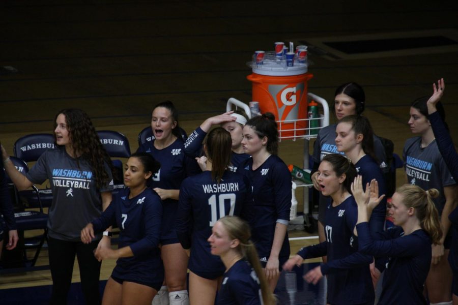 Feelin good: Washburn's bench celebrates after a point in the third set on Oct. 1, 2021. The Ichabods would beat Newman 3-0 in the match.