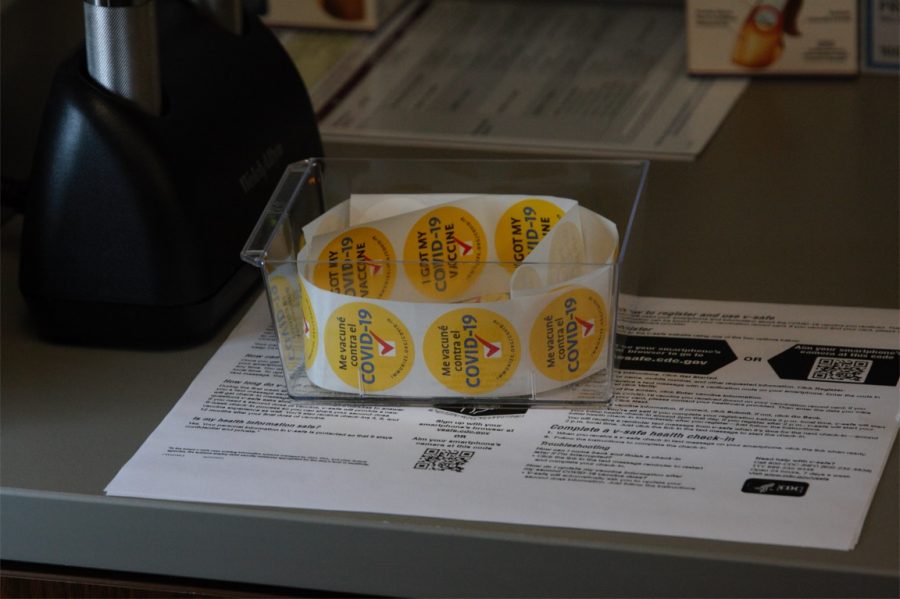 A roll of stickers sit ready in a patient room. Washburn Universitys Student Health office has administered over 2,000 doses.