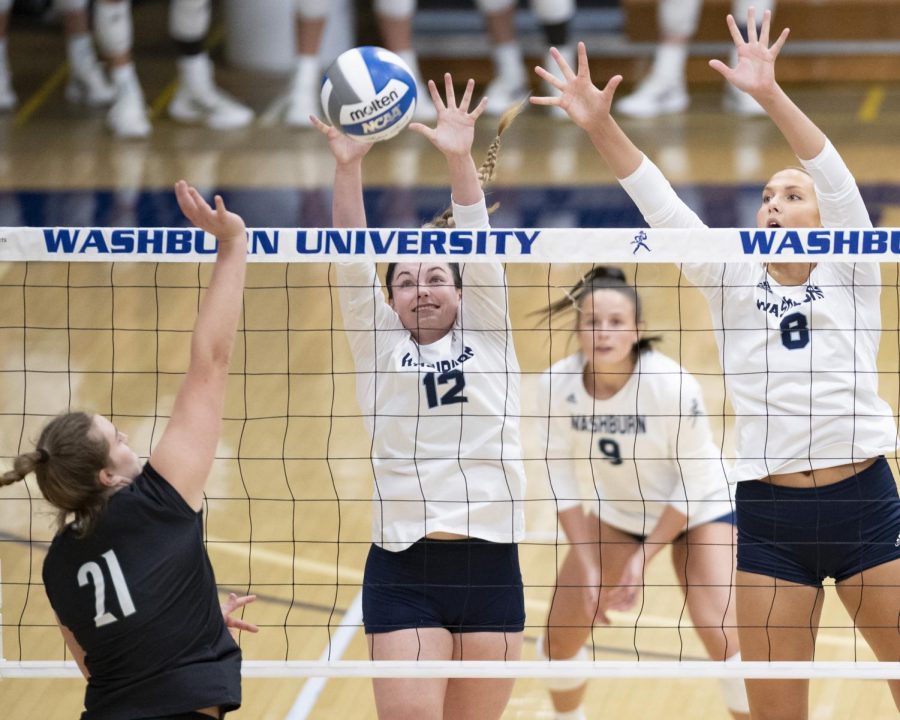 Washburn+setter+Allison+Sadler+%2812%29+and+middle+hitter+Allison+Maxwell+%288%29+reach+to+block+the+ball+Saturday%2C+Nov.+13%2C+2021%2C+at+Lee+Arena+in+Topeka%2C+Kansas.+Washburn+recorded+12+blocks+as+a+team+in+the+match.