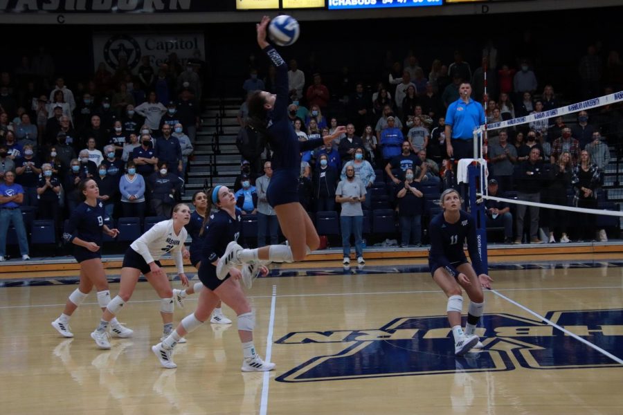 Washburn+outside+hitter+Genna+Berg+%281%29+jumps+to+make+an+attack+on+Nov.+16%2C+2021.+Berg+knocked+down+16+kills+in+the+match.