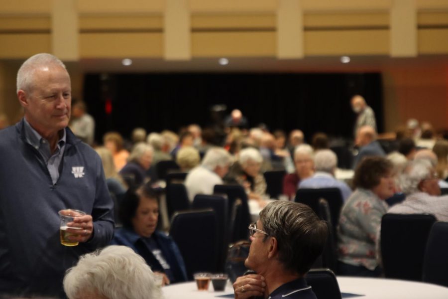 Reunion: Two alumnus talk about their time at Washburn at the After Hours event on Oct. 29, 2021. The After Hours event was held in the A&B room in the Memorial Union.