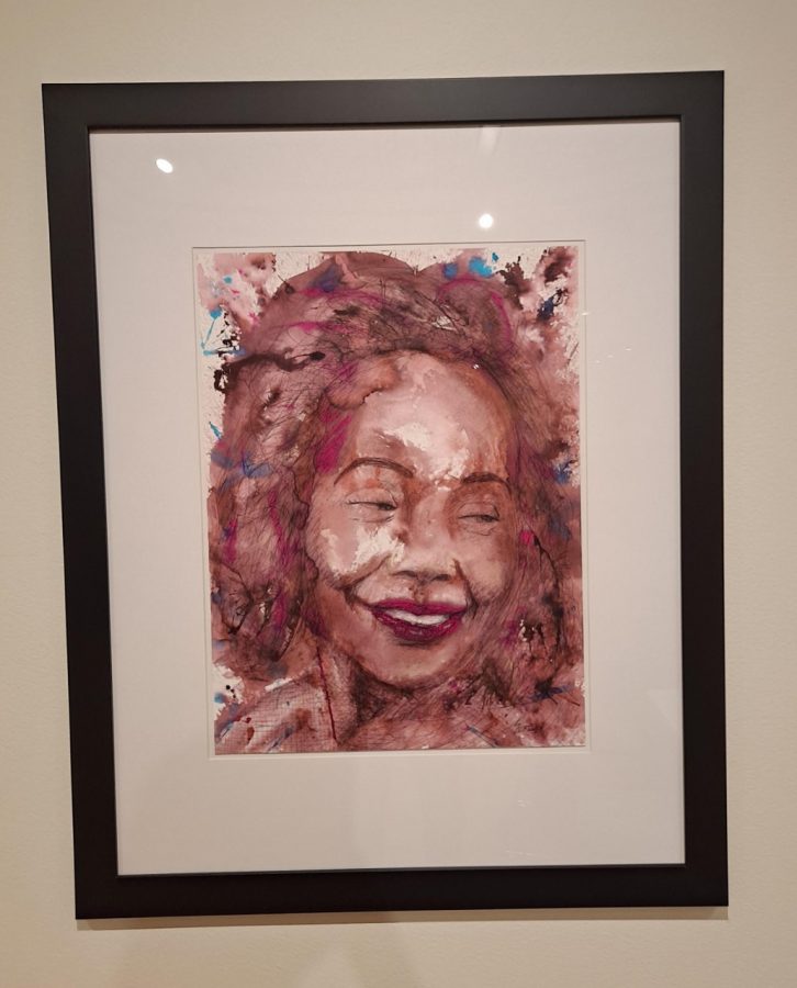 One of John Sebelius portraits hangs on the wall for his Powerful Women series. The piece was displayed among other artists work at the Mulvane Art Museum on Nov. 5, 2021.