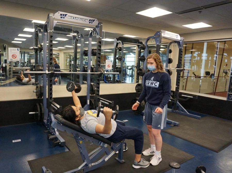 Personal trainer works to encourage and assist student. The SRWC started this program in the hopes to encourage students to hit the gym to stay healthy.