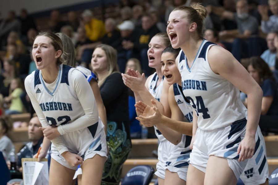 The+Washburn+bench+cheers+after+scoring+Wednesday%2C+Dec.+1%2C+2021%2C+at+Lee+Arena+in+Topeka%2C+Kansas.+The+Ichabods+fell+to+Emporia+State+72-50+in+the+game.